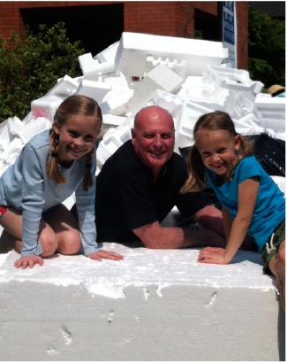father  mike and friends on a mountain of styrofoam